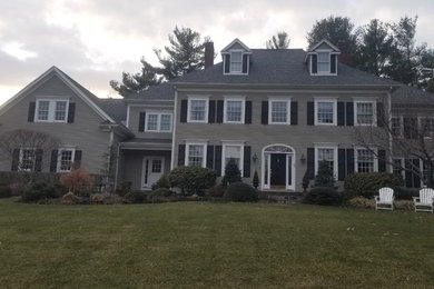 Example of a large classic home design design in Boston