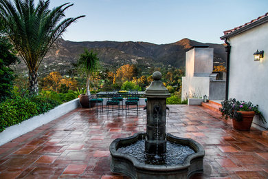 Example of a tuscan patio design in Santa Barbara