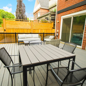 Synthetic Decking With Connecting Stone Patio