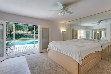 Example of a mid-century modern bedroom design in Dallas