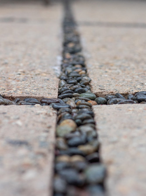 Open spaces or filled between pavers?