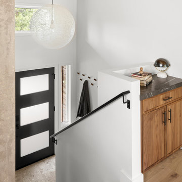 Modern Foyer with Custom Cabinetry