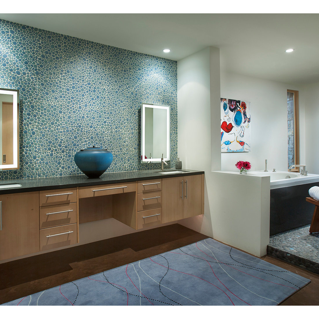 Master bath with glass pebble back splash and floating vanity