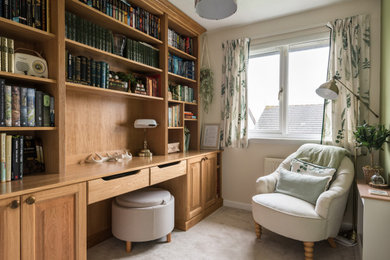 Photo of a medium sized classic home office in Edinburgh with a reading nook, white walls, carpet, a built-in desk, grey floors and feature lighting.