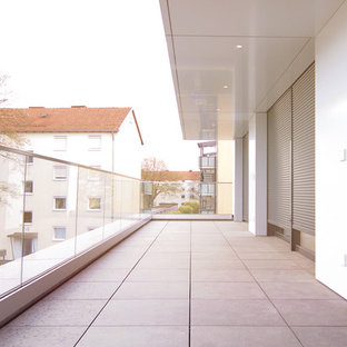 Erweiterung, Umbau und Modernisierung eines Dreifamilienhauses (KfW 55)