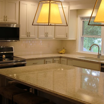 Davenport, IA- White Painted Kitchen With Gold Accents and Large Island