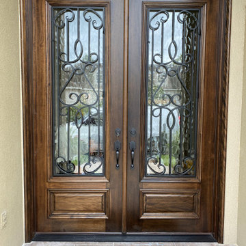 Wood Doors with Wrought Iron
