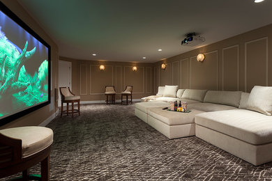 Inspiration for a large modern enclosed home theatre in New York with brown walls, carpet, a projector screen and grey floor.
