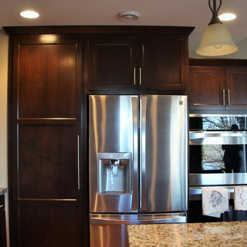 Staggered Kitchen Cabinets with Hidden Pantry
