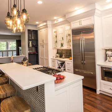 Transitional White Kitchen Remodel | Glass Display Cabinets & Custom Island