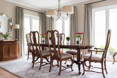 Example of a transitional dining room design in Other