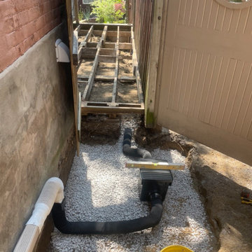 New hardscape stone paver pathway with drain installation
