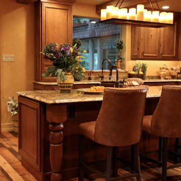Mediterranean Luxury Kitchen Remodel | Stone Accents & Arched Detailing