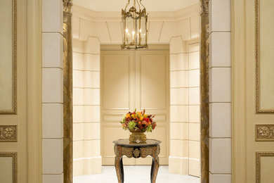Photo of a small traditional foyer in Chicago with a double front door and beige walls.