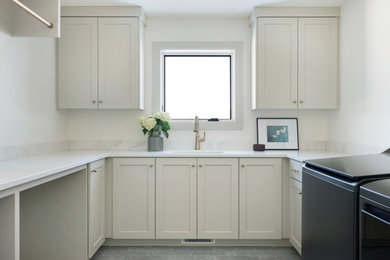 Inspiration for a transitional laundry room remodel in Minneapolis