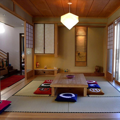 Example of a mid-sized zen home design design in Denver