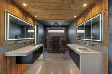 Inspiration for a large master gray tile and porcelain tile concrete floor, gray floor, double-sink, wood ceiling and wood wall bathroom remodel in Seattle with flat-panel cabinets, black cabinets, an integrated sink, concrete countertops, gray countertops and a floating vanity