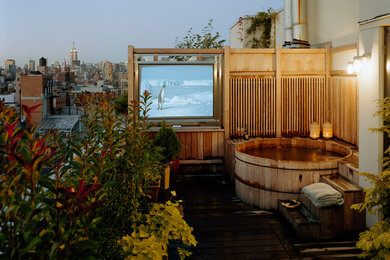 Example of a trendy rooftop rooftop deck container garden design in New York with no cover