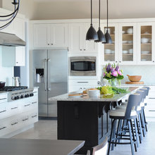 white cabinets, dark island