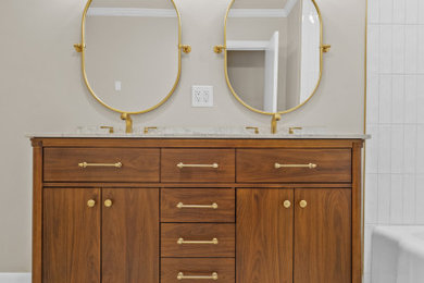 Mid-sized trendy master white tile and porcelain tile porcelain tile, gray floor and double-sink bathroom photo in Dallas with flat-panel cabinets, dark wood cabinets, a two-piece toilet, beige walls, an undermount sink, quartz countertops, white countertops and a freestanding vanity