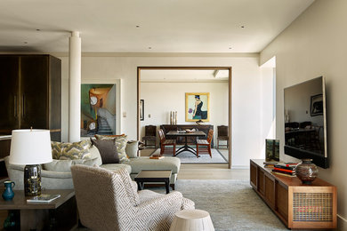 Transitional open concept medium tone wood floor and brown floor living room photo in Philadelphia with white walls and a wall-mounted tv