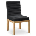 Meridian Furniture - Evelyn Upholstered Dining Chair, Black, Velvet, Natural Finish - Transform your dining area with the Evelyn dining chair, featuring luxurious black velvet upholstery. Supported by rich natural solid ash wood legs and detailed with deep channel tufting, this chair exudes both durability and opulence. The 460 GSM velvet offers a sumptuous texture, while the contemporary design ensures it makes a striking addition to any space. This chair seamlessly blends style and comfort, perfect for creating a refined dining experience.