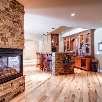 Parker Basement Home Bar and Stone Fireplace