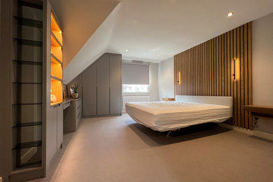 Design ideas for a large bedroom in Sussex.
