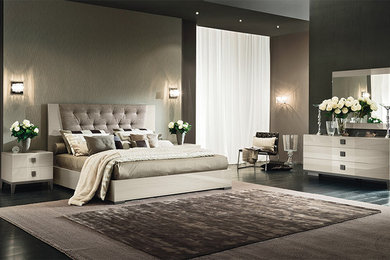 Inspiration for a large modern master dark wood floor bedroom remodel in Boston with gray walls