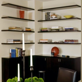 Inspiration for a modern home office and library in New York with bamboo flooring.
