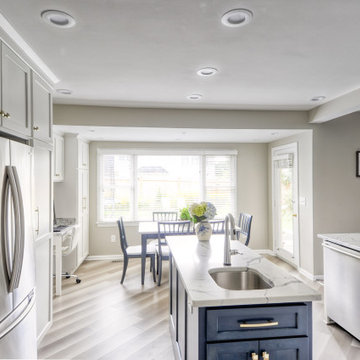 Navy Stained Island, Hood vent and Floating Shelves in White Shaker Kitchen