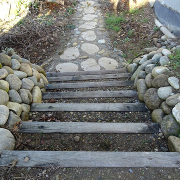 Escalier en traverse de chêne et muret de soutènement