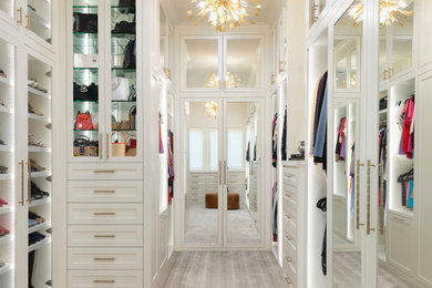 Large transitional gender-neutral carpeted and beige floor walk-in closet photo in Dallas with shaker cabinets and white cabinets