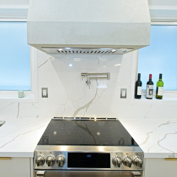 Custom Plaster Range Hood with Pot Filler and Veined Backsplash | North York