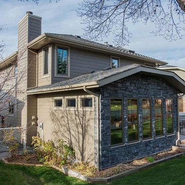 Calgary Hardie Siding, Stone and Longboard Exterior Renovation
