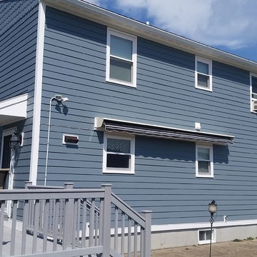 James Hardie Siding in Boothbay Blue with GAF Timberline HD Shingles