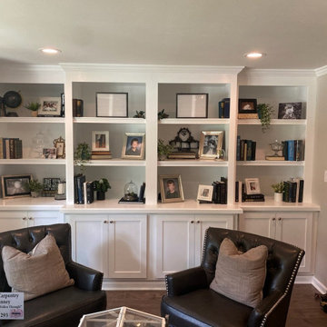 Built In Cabinets With Shelving, Crown Molding And Recessed Lighting
