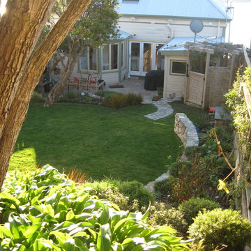 Massed, low-maintenance, easy care native and ornamental mix.