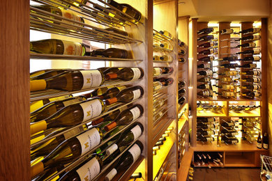 Wine cellar - contemporary wine cellar idea in Charlotte