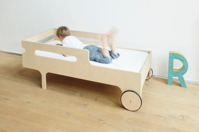 Cette photo montre une chambre d'enfant tendance.