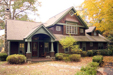 Inspiration for a mid-sized red two-story brick exterior home remodel in New York