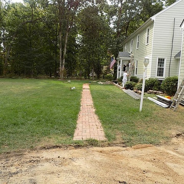 Old narrow front walk made of clay pavers--PRE-CONSTRUCTION