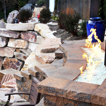 Rustic Pool With Hot Tub And Natural Landscaping