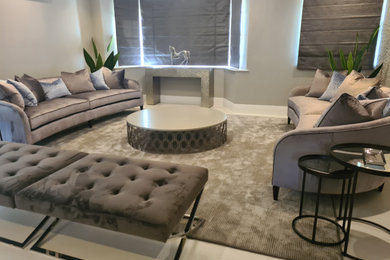 Design ideas for a large contemporary formal and grey and cream open plan living room in Hertfordshire.