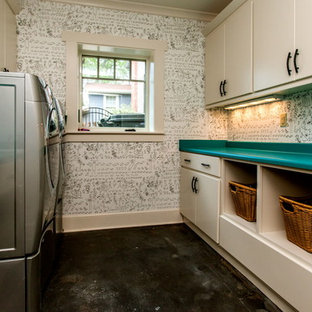 Inspiration for a classic utility room in Other with concrete flooring and turquoise worktops.
