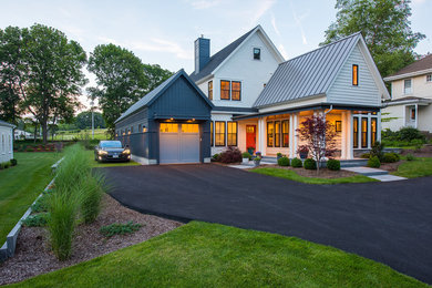 Mid-sized country white two-story concrete fiberboard exterior home idea in Boston with a mixed material roof