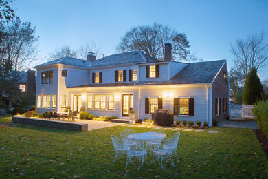 Example of a transitional home design design in Boston
