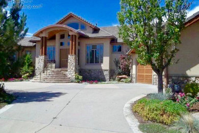 Transitional exterior home idea in Denver