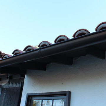 Half Round Rain Gutters with Wrap Around 10 Gauge Twisted Rafter Mount Brackets