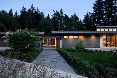 Home design - large farmhouse home design idea in Portland